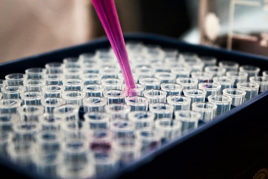 Laboratory glassware containing blue water-based solutions under scientific lighting
